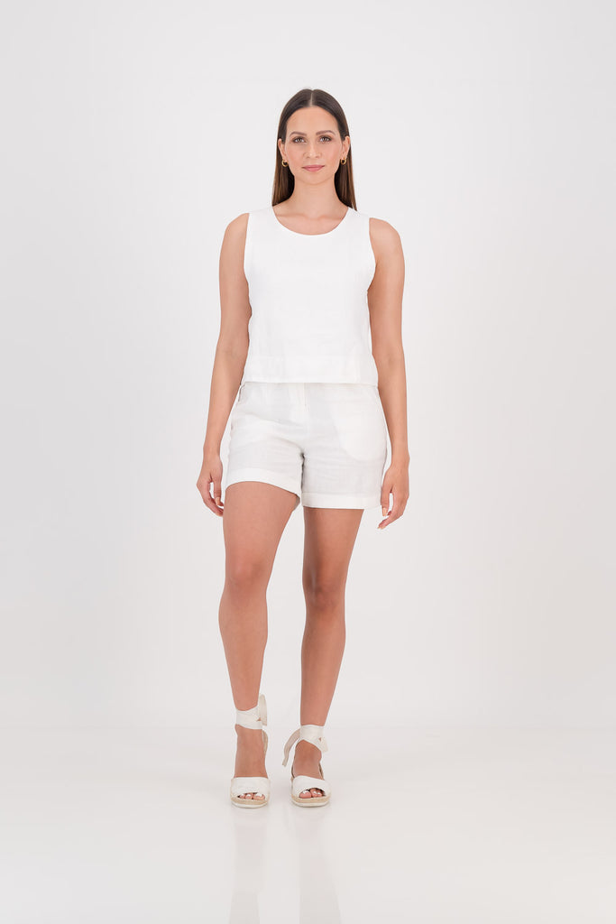 Woman wearing a white Parker Shorts facing forwards